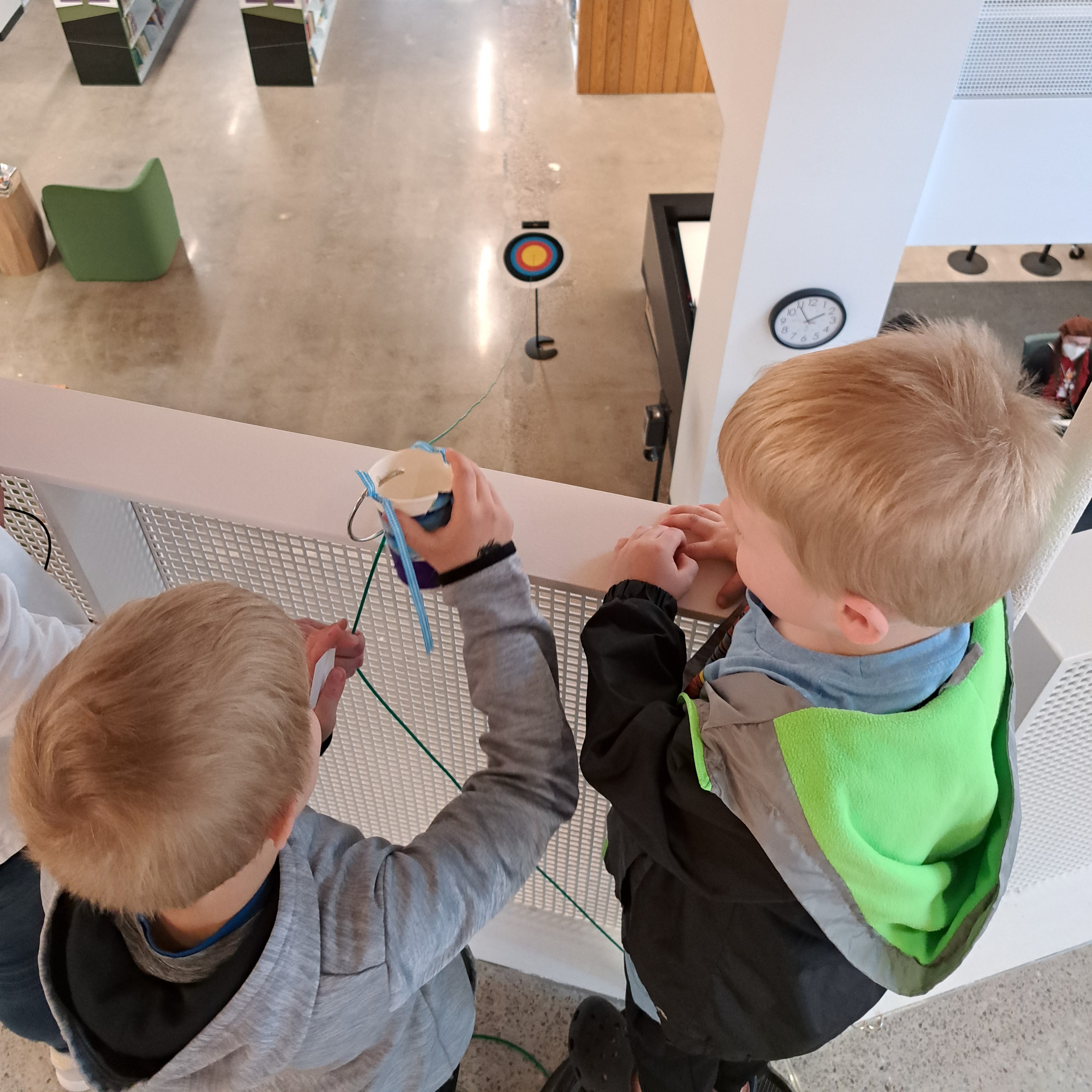 Children using zip line craft