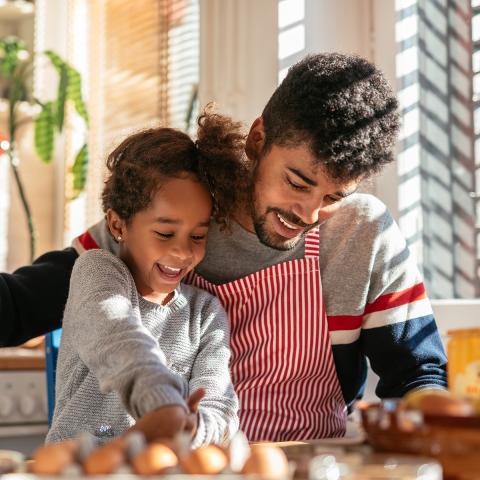 Father and daughter cooking