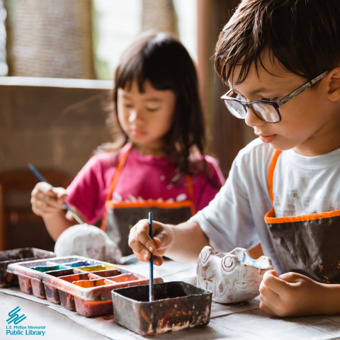 Two children painting