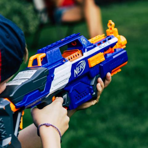 teen holding nerf gun