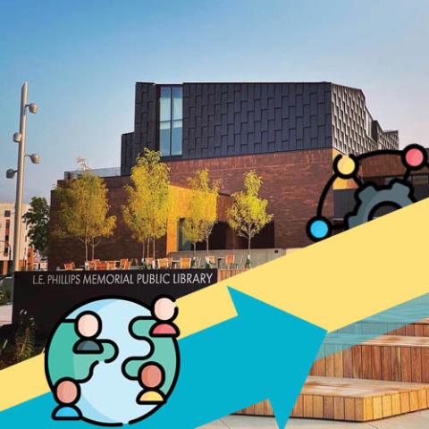 A photo of the library building featuring blue and yellow illustrations.