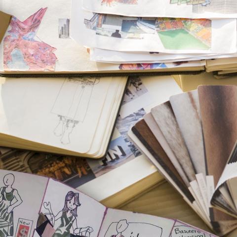 A photograph of paper scraps and materials.