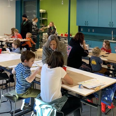 Children and adults making art