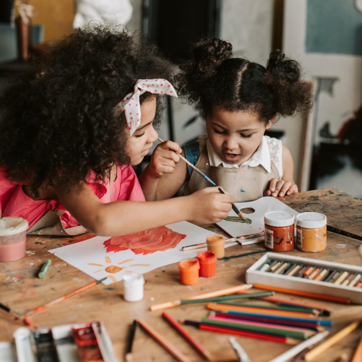 two girls painting