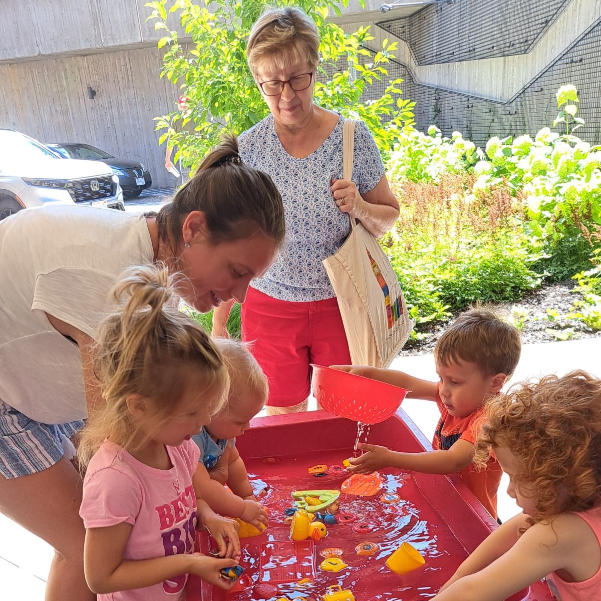 Group of kids playing in water. 