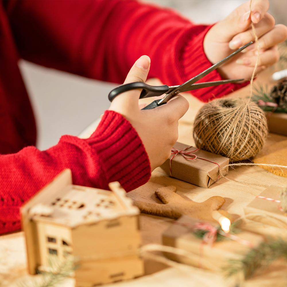 A photograph of a child doing festive crafts